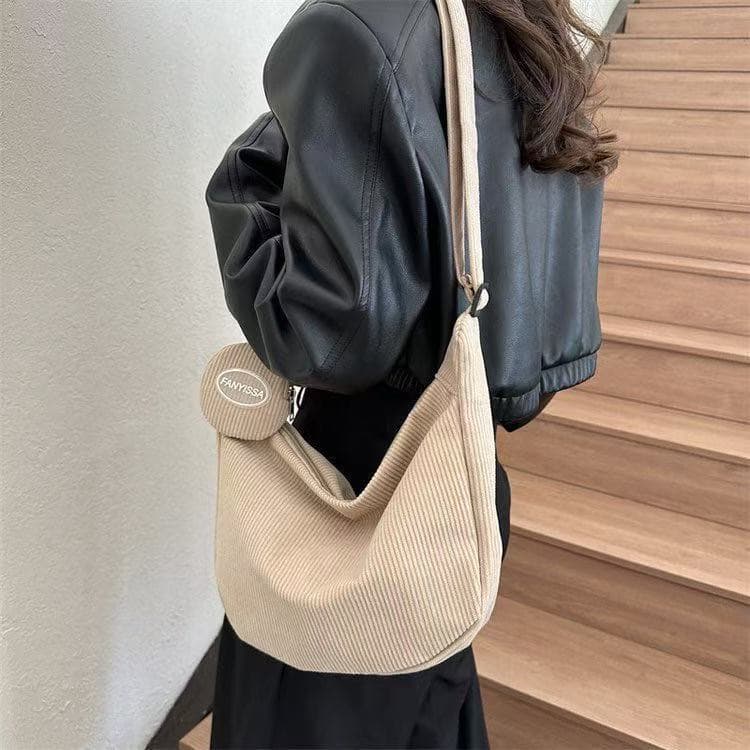 Bolsa transversal de veludo cotelê com porta-moedas